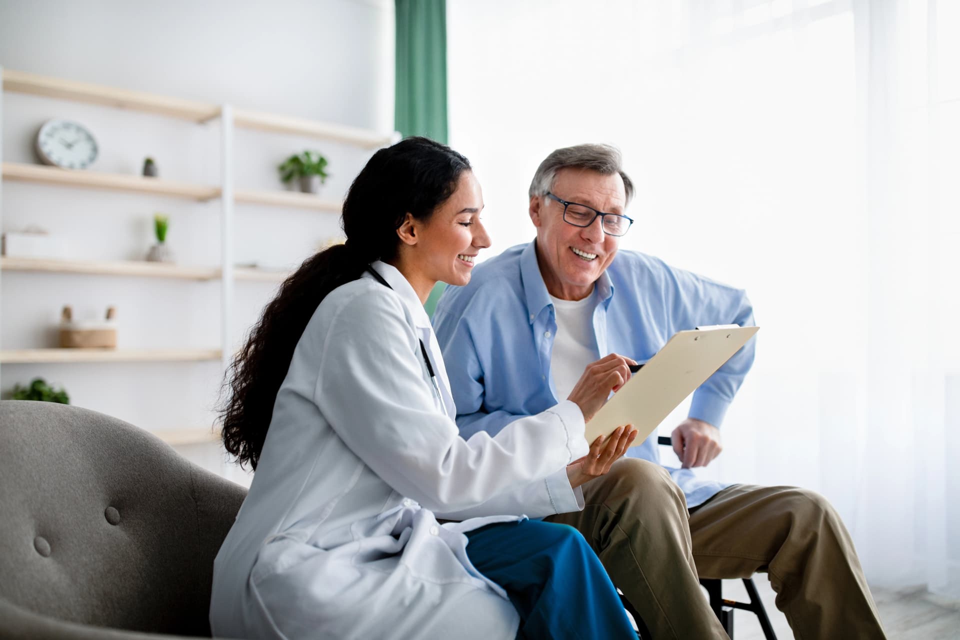 Doctor showing a scan to a patient